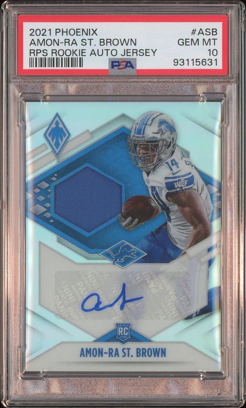2021 Panini Phoenix RPS Rookie Auto Jersey Amon-Ra St. Brown #RJA-ASB /299 PSA 10